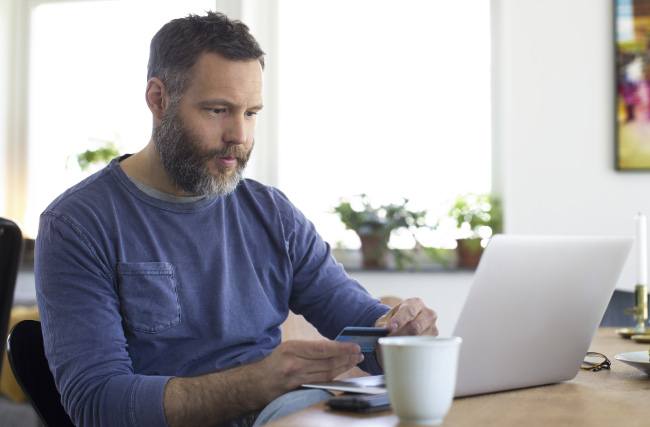Guy on computer working