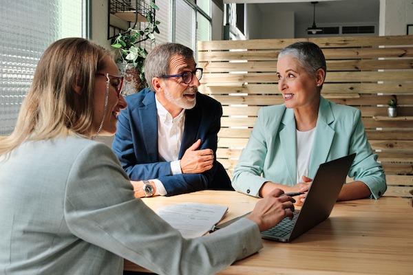 Nonprofit employees looking at donor data