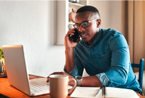 Man on phone with DonorPerfect Support