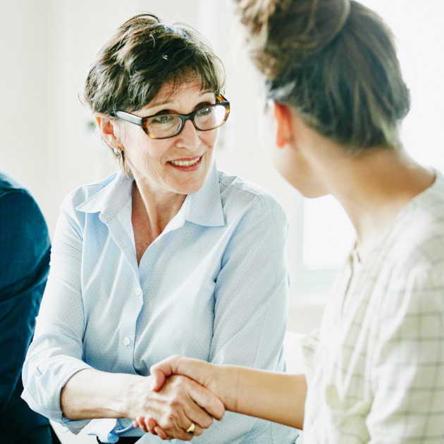 a nonprofit executive networking with a potential major donor - featured image