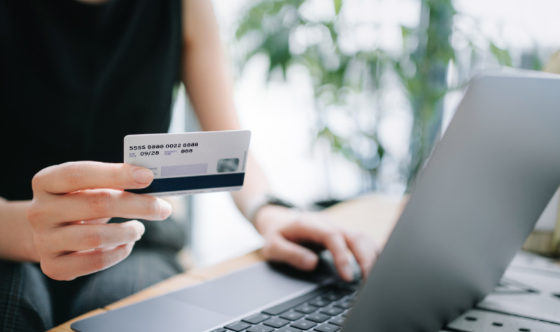 Woman donating securely online