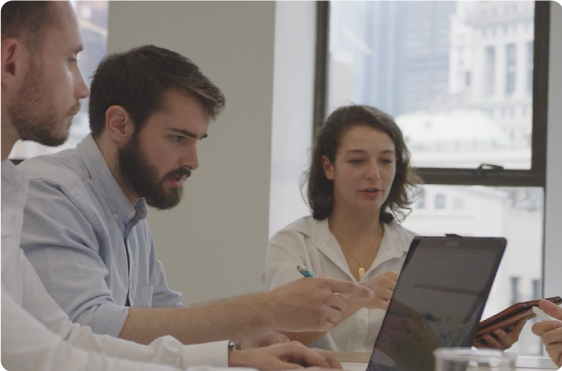 people looking at computer